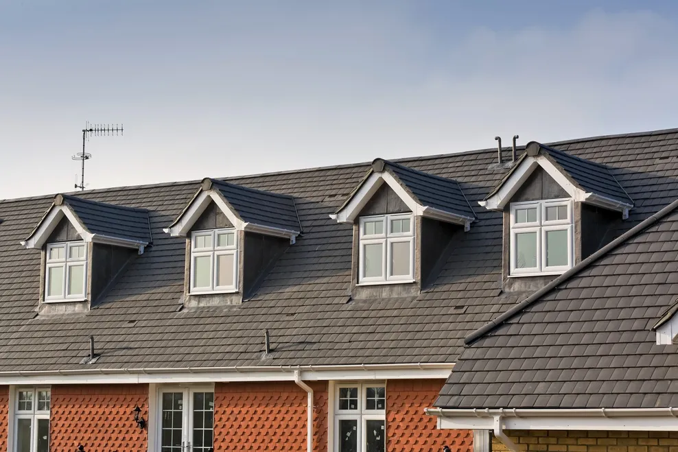 BMI Redland DuoPlain single lap concrete in Charcoal Grey at Belstone Homes Bushey 